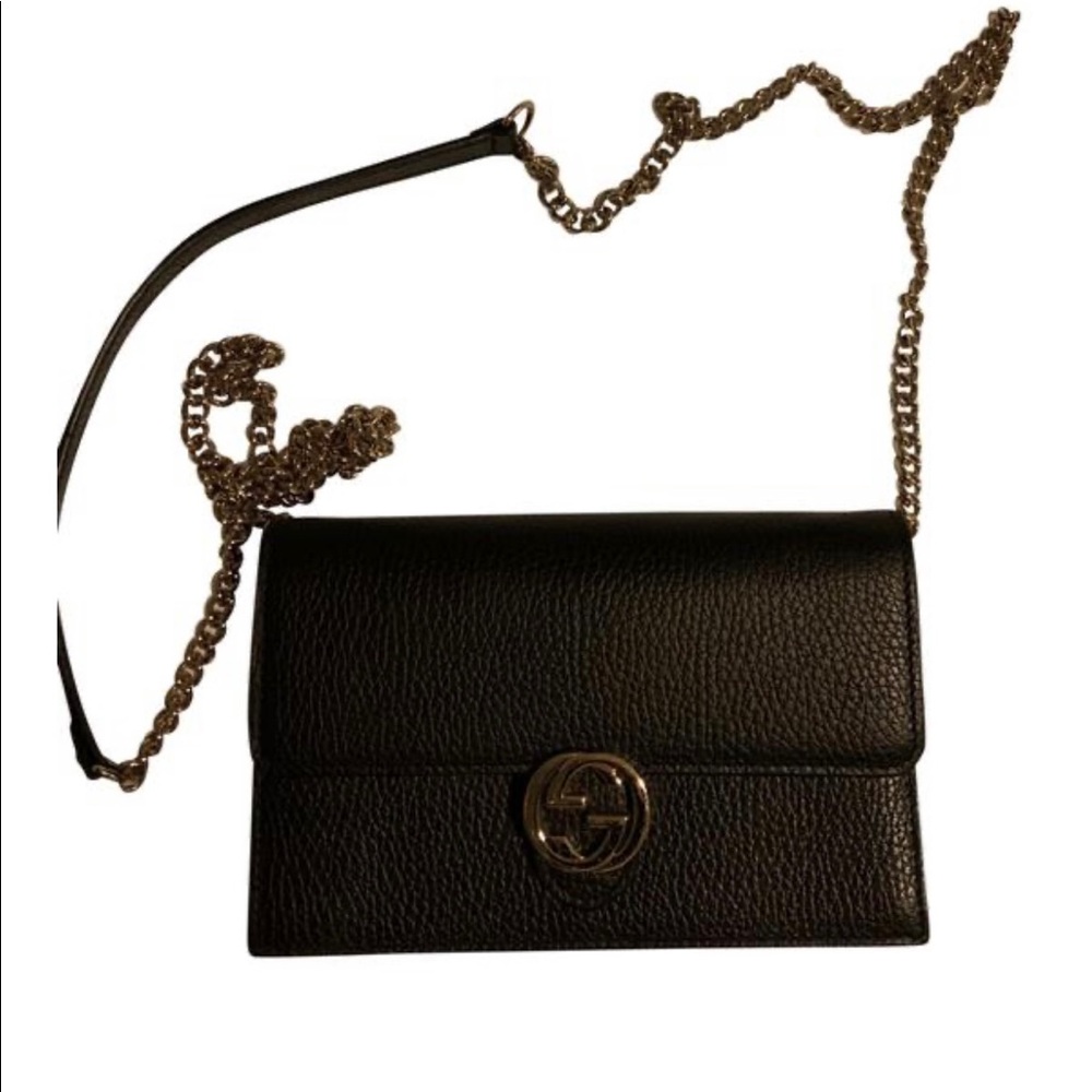 Gucci wallet handbag. Used for a few months but minimal use since then.